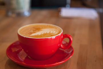 latte in a red mug