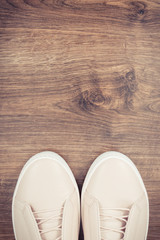 Vintage photo, Womanly leather shoes on board