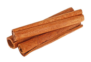 Few cinnamon sticks on a white background