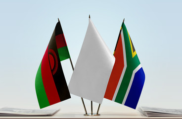 Flags of Malawi and Republic of South Africa with a white flag in the middle