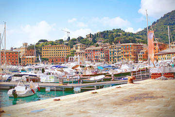 a cozy town of Santa Margarita in Italy, a dock with yachts and boats