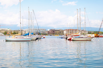 lake in Geneva Switzerland, dock with boats and yachts
