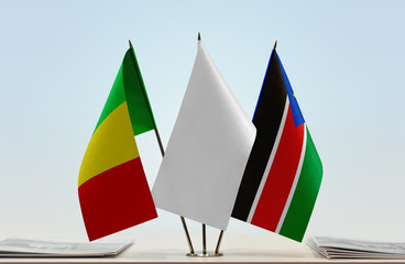 Flags of Mali and South Sudan with a white flag in the middle