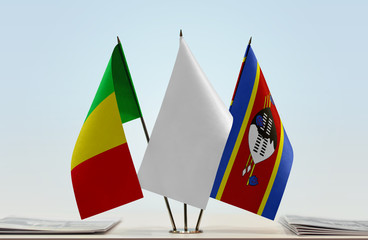 Flags of Mali and Swaziland with a white flag in the middle