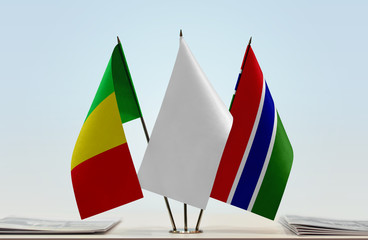 Flags of Mali and The Gambia with a white flag in the middle