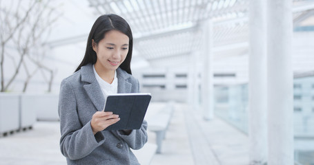 Businesswoman using tablet computer