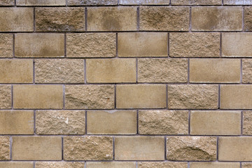 Wall of stone blocks. Decorative stone, Stone brick. 