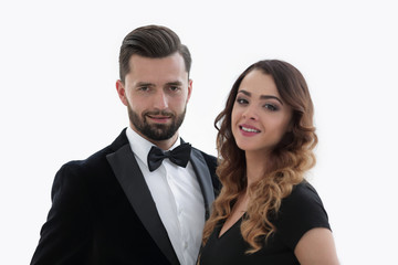 Portrait of a handsome man looking at the camera with a woman