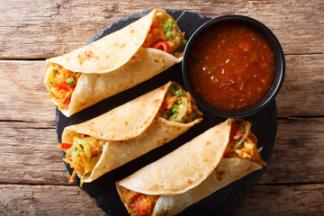 Indian veg spring roll stuffed with various vegetables close-up. horizontal top view