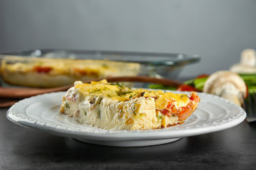 Plate with delicious casserole on table, closeup. Fresh from oven
