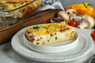 Plate with delicious casserole on table, closeup. Fresh from oven