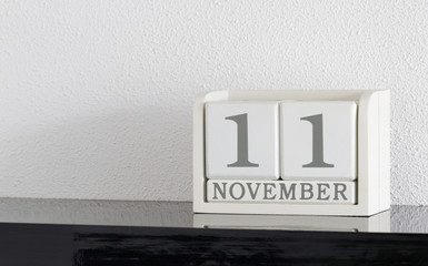 White block calendar present date 11 and month November