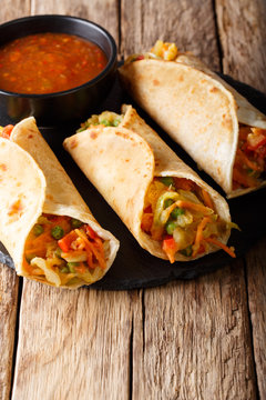 Indian popular snack food called Vegetable spring rolls or veg roll or veg franky close-up. Vertical