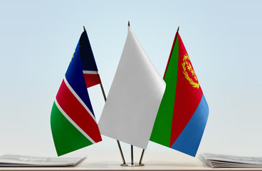 Flags of Namibia and Eritrea with a white flag in the middle