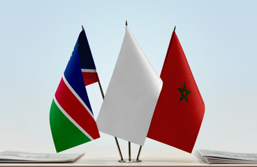 Flags of Namibia and Morocco with a white flag in the middle