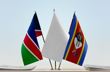 Flags of Namibia and Swaziland with a white flag in the middle