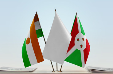Flags of Niger and Burundi with a white flag in the middle