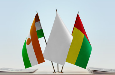 Flags of Niger and Guinea-Bissau with a white flag in the middle