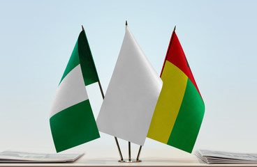 Flags of Nigeria and Guinea-Bissau with a white flag in the middle