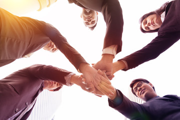 Business people joining hands.Team work concept.