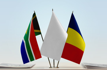 Flags of Republic of South Africa and Chad with a white flag in the middle