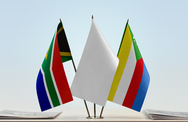 Flags of Republic of South Africa and Comoros with a white flag in the middle