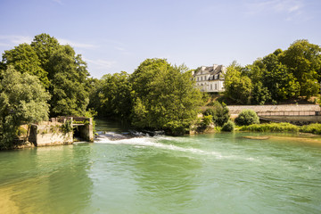 Fototapeta na wymiar The river Aube as it flows through Arcis-sur-Aube and the Island of Cherlieu, Grand Est, France