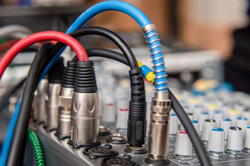Blue DJ audio mixer shot close-up 