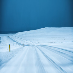 Blue winter Iceland road, travel in winter, concept photo