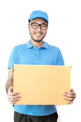 Young Asian man with delivery service worker in uniform. Man holding Box with attractive smiling isolated on white background.