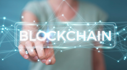 Businesswoman using blockchain cryptocurrency interface 3D rendering