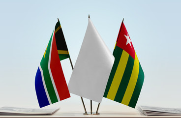 Flags of Republic of South Africa and Togo with a white flag in the middle