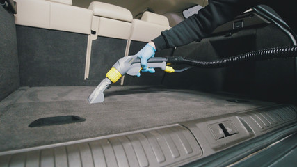 Small business - cleaning of vehicle wardrobe with vacuum cleaner