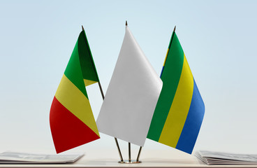 Flags of Republic of the Congo and Gabon with a white flag in the middle