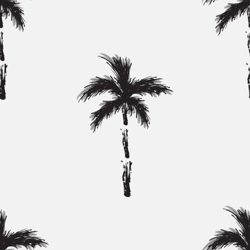 Black vector palm trees isolated on white background. Hand drawn seamless pattern