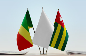 Flags of Republic of the Congo and Togo with a white flag in the middle