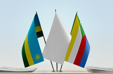 Flags of Rwanda and Comoros with a white flag in the middle