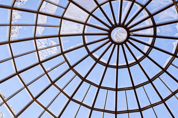 Round glass roof. Modern architecture. Blue color