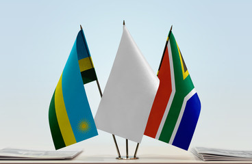 Flags of Rwanda and Republic of South Africa with a white flag in the middle