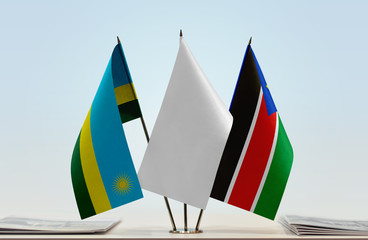 Flags of Rwanda and South Sudan with a white flag in the middle