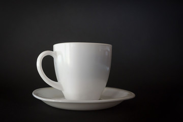 Hot drink cup on black background.