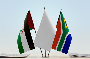 Flags of Sahrawi Arab Democratic Republic and Republic of South Africa with a white flag in the...