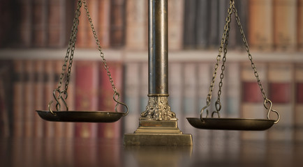 Law and Justice concept. Law books on background