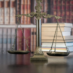 Law and Justice concept. Law books on background