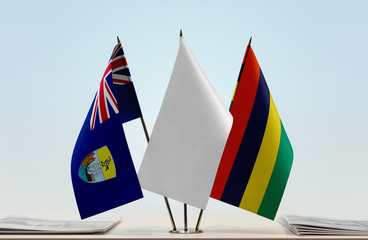 Flags of Saint Helena and Mauritius with a white flag in the middle