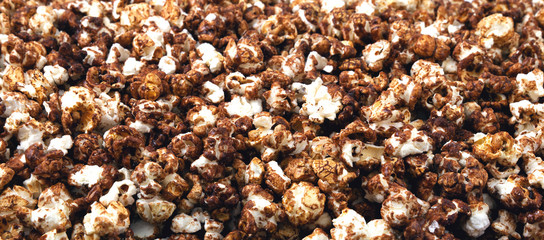 Panorama of chocolate popcorn.