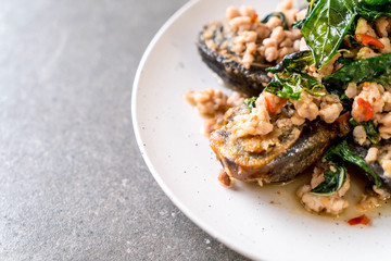Stir-fried Century Egg and Minced Pork with Holy Basil Leaves
