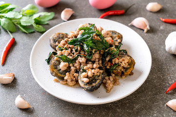 Stir-fried Century Egg and Minced Pork with Holy Basil Leaves