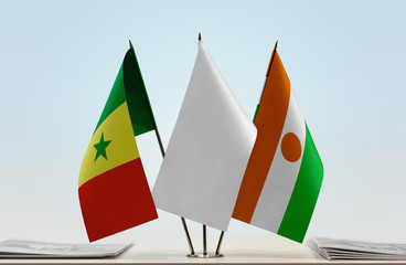 Flags of Senegal and Niger with a white flag in the middle