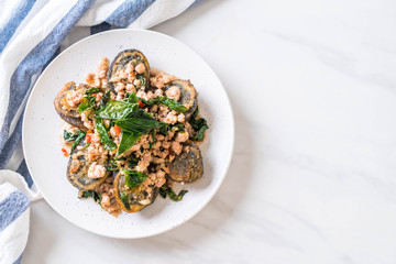 Stir-fried Century Egg and Minced Pork with Holy Basil Leaves